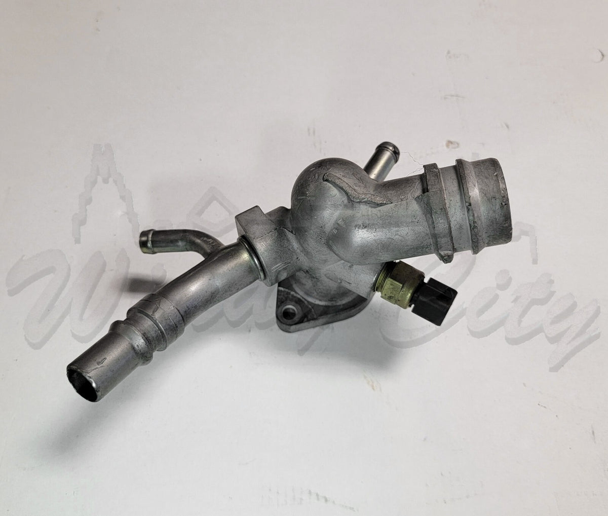 1.6L HYUNDAI KIA COOLANT THERMOSTAT HOUSING USED OEM 256002B760